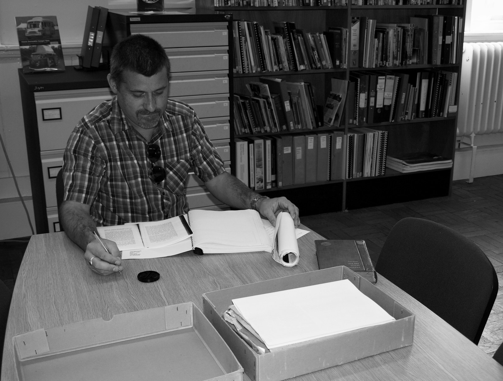 John Maker researching in the archives
